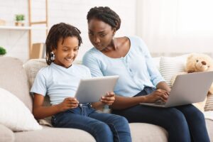Caring mom providing children's online privacy protection