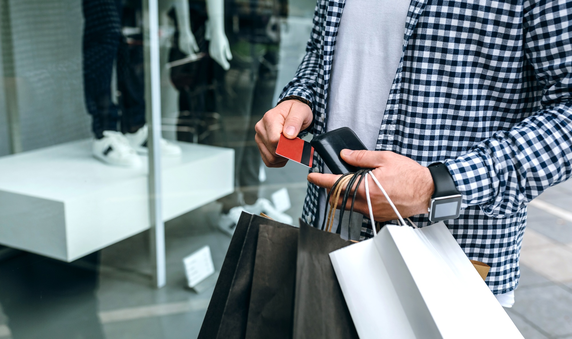 Man taking out credit card